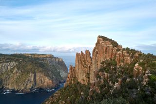 Four days. Three nights. Cliffs, sea and sky.

The Three Capes Signature Walk explores the dramatic coastline of Tasmania's Tasman Peninsula, where some of Australia's highest sea cliffs rise straight from the Southern Ocean.

Walk through coastal heath, eucalypt forest and clifftop trails, with every turn revealing another breathtaking view.

Led by expert guides, with small groups and exclusive accommodation overlooking the water.

By day, it's fresh ocean air, towering dolerite formations and unforgettable scenery.
By night, it's chef-inspired meals, comfortable lodges and sunsets over the coastline.

A front-row seat to one of Australia's most spectacular coastal landscapes.

#GreatWalksOfAustralia #ThreeCapesSignatureWalk #TasmaniaTravel #WalkAustralia #MultiDayWalk