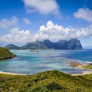 Lord Howe Island lagoon with Mount Gower and Mount Lidgbird rising above turquoise waters and lush green hills